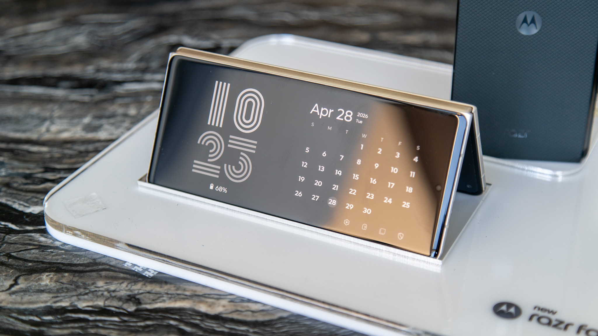 Motorola Razr Fold showing a calendar on the external display