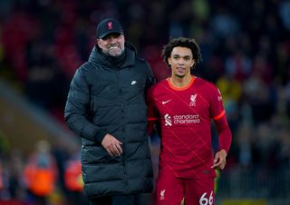 Liverpool manager Jurgen Klopp (left) hugs Trent Alexander-Arnold at the end of the Premier League match at Anfield, Liverpool. Picture date: Saturday November 20, 2021
