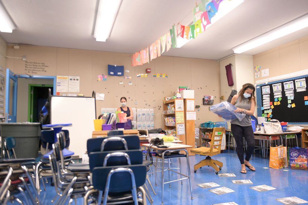 Teachers Nancy Rastetter and Marisa Wiezel, who is related to the photographer, prepare for the 2020/2021 school year in Wiezel&amp;#039;s classroom at Yung Wing School P.S. 124 on August 25, 2020 in 