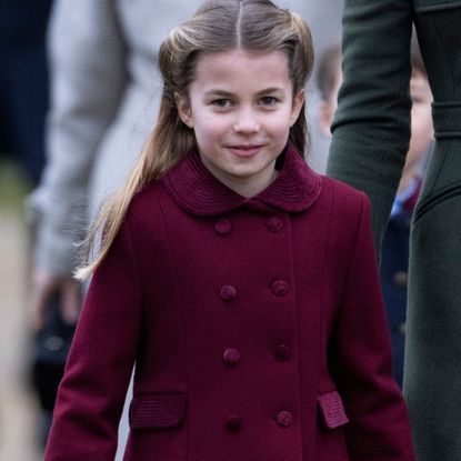 Princess Charlotte wears a maroon coat on Christmas Day 2022