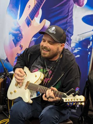 Black Stone Cherry's Chris Robertson, performing at the 2024 NAMM show