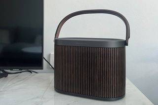 Bang & Olufsen Beosound A5 speaker on entertainment unit
