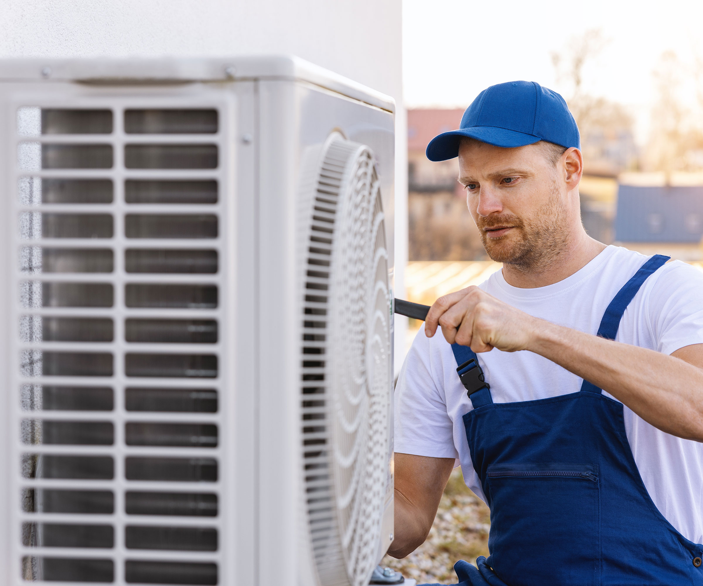 man installing HVAC