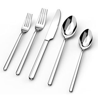 A silverware set with two forks, a knife, and two spoons