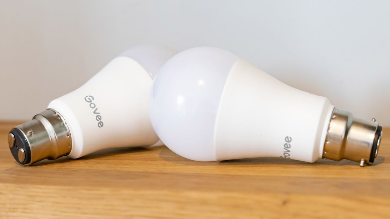 the Govee Wi-Fi LED Bulb comes in a twin pack - both bulbs seen here on a wooden shelf