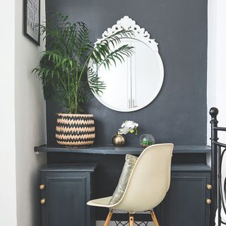 Potted palm houseplant on desk