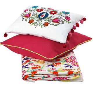 Bright cushions with bold floral patterns