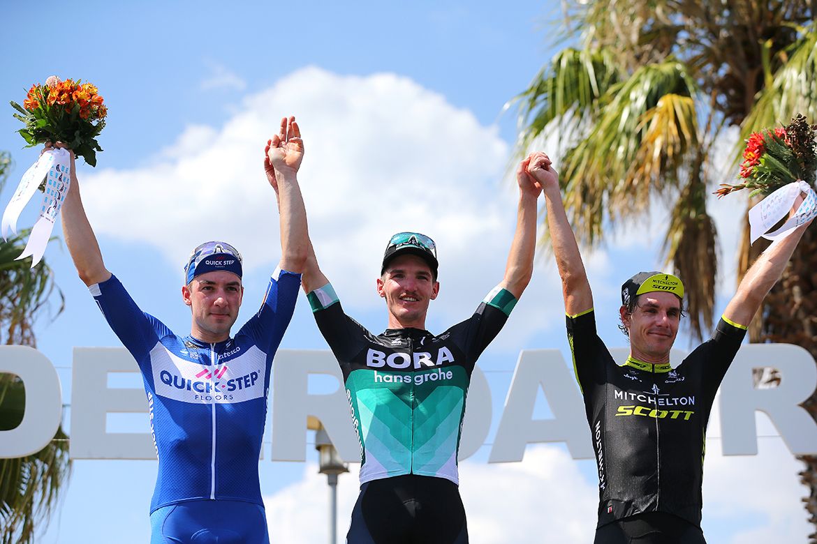 Elia Viviani, Jay McCarthy and Daryl Impey on the podium