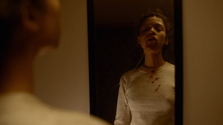 Taylor Russell as Maren after eating a human finger in Bones And All