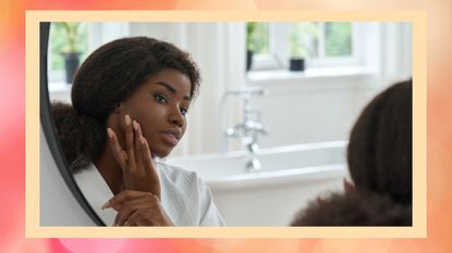 young woman inspecting skin in the mirror