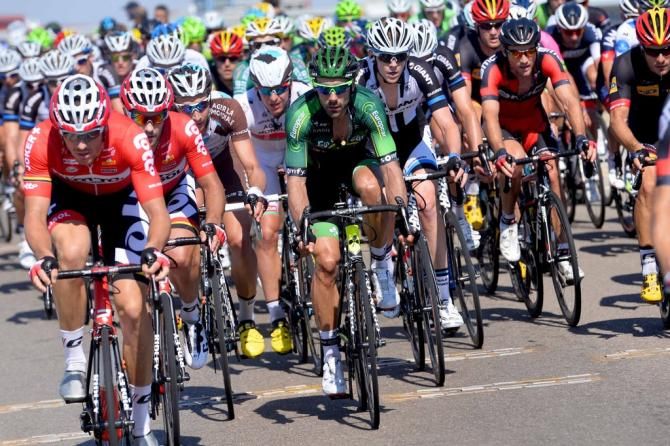 Adam Hansen (Lotto-Belisol) on the front of the main bunch