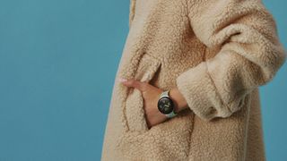Person wearing Pixel Watch and jacket