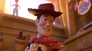 Woody showing off his poncho to other toys in Toy Story 5