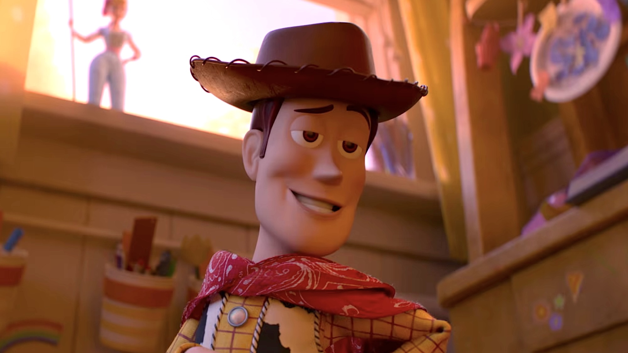 Woody showing off his poncho to other toys in Toy Story 5