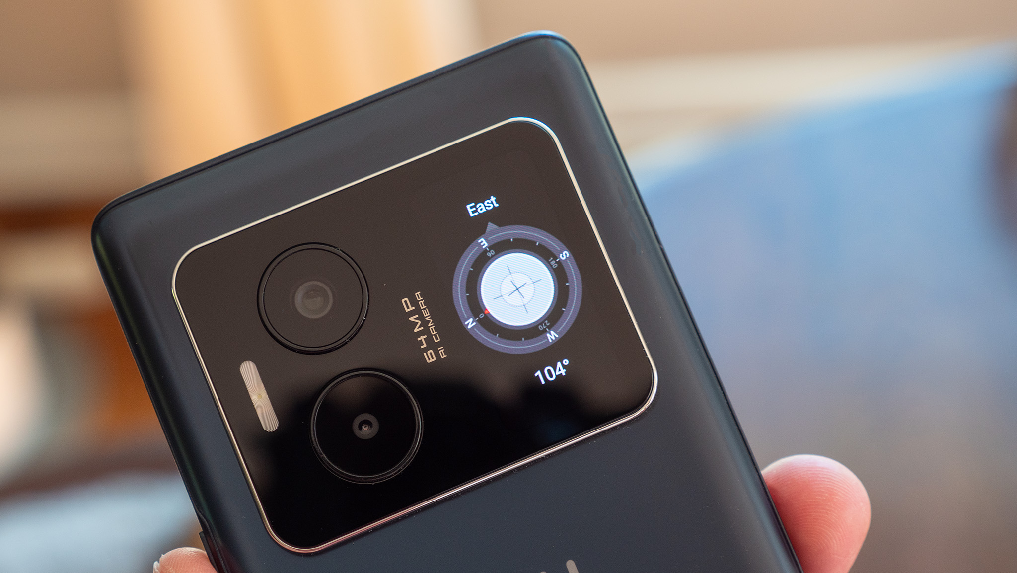The compass tile on the 1.6-inch rear AMOLED display on the NUU B40 5G