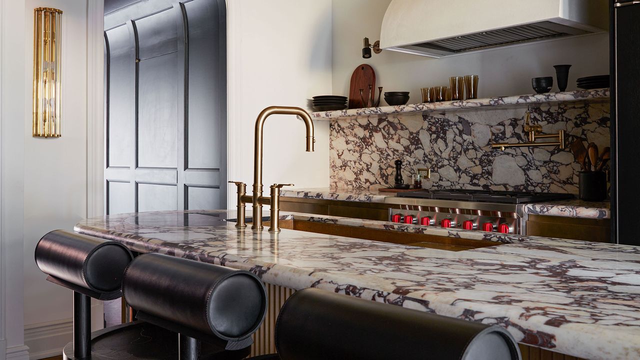 a shot across a kitchen with a bold marble countertop