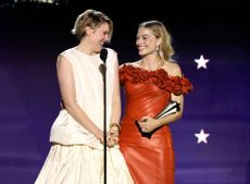 Greta Gerwig and Margot Robbie accept the Best Comedy Award for "Barbie" onstage during the 29th Annual Critics Choice Awards