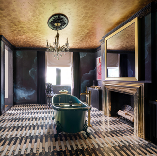 A bathroom with gold leaf ceiling