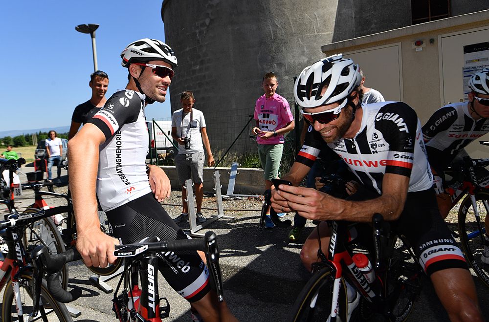 Tom Dumoulin and Laurens ten Dam wait to start the rest-day training ride