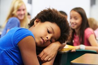 a girl gets bullied by other students