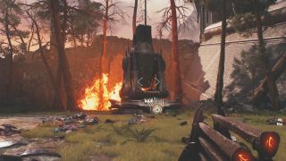 Doom: The Dark Ages artillery cannon locations Siege Part 1 - An artillery cannon surrounded by burned trees and a raging fire.