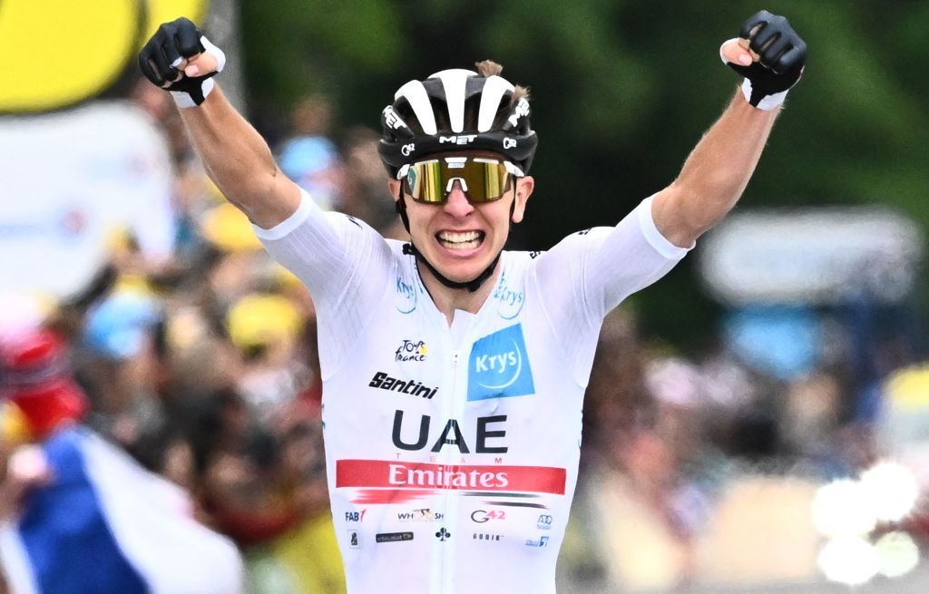 UAE Team Emirates teams Slovenian rider Tadej Pogacar celebrates as he cycles to the finish line to win the 6th stage of the 109th edition of the Tour de France cycling race 2199 km between Binche in Belgium and Longwy in northern France on July 7 2022 Photo by AnneChristine POUJOULAT AFP Photo by ANNECHRISTINE POUJOULATAFP via Getty Images