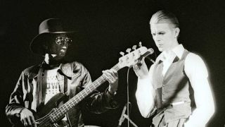 George Murray onstage with David Bowie