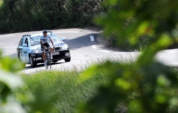 Contador and the team car take in the climb