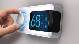 Thermostat on wall reading 68 degrees Fahrenheit – the optimal temperature for sleeping