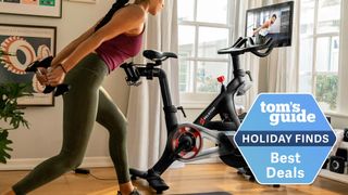 Woman working out near Peloton bike