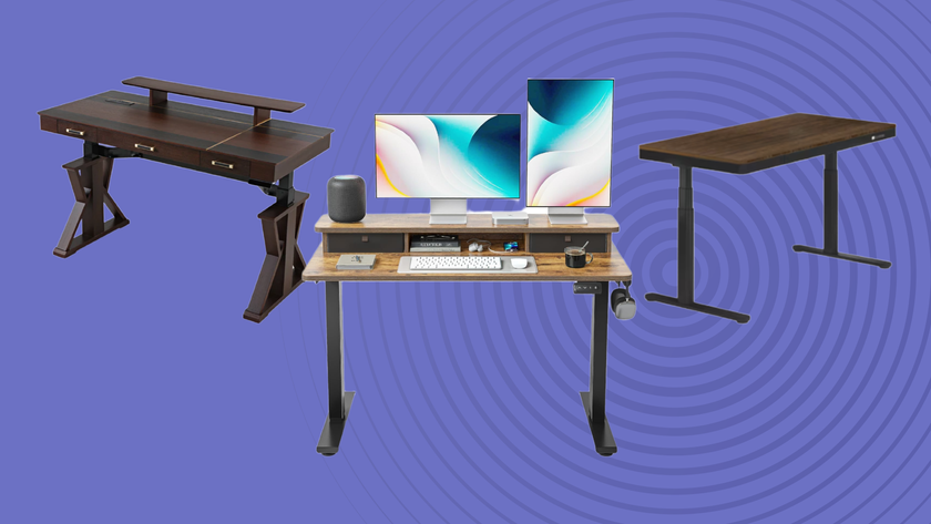 Three standing desks with drawers on a purple background with the TechRadar radar symbol behind them