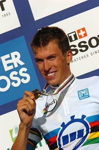 Dominique Cornu (Belgium) shows off his gold medal