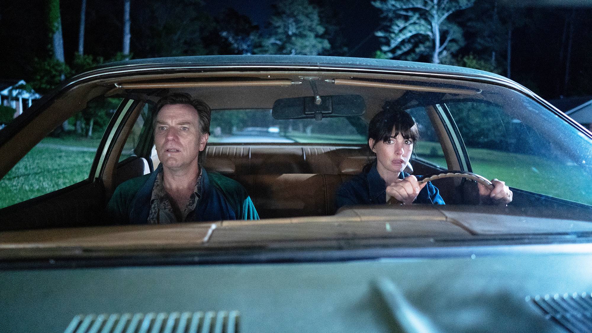 EWAN McGREGOR as Greg Platt and ANNE HATHAWAY as Denise Platt in &amp;ldquo;The End of Oak Street&amp;rdquo; movie