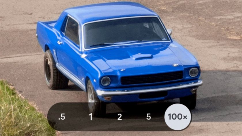 100x zoom image of a blue car