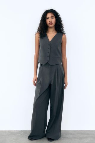 Trousers With Double Pleat