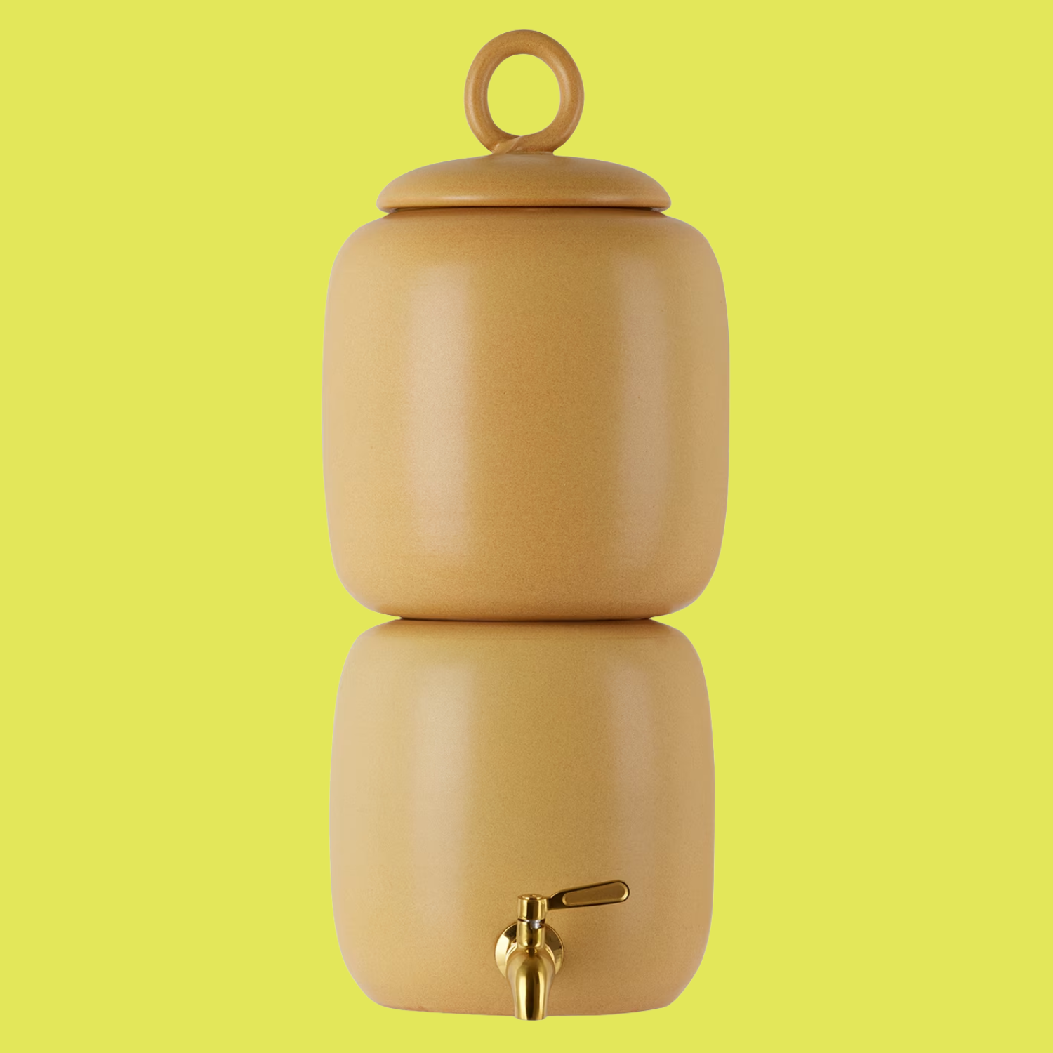 A sandy brown ceramic water dispenser against a neon green yellow backdrop