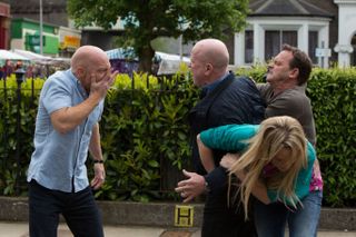 Max Branning gets a punch in the face from Phil Mitchell in EastEnders
