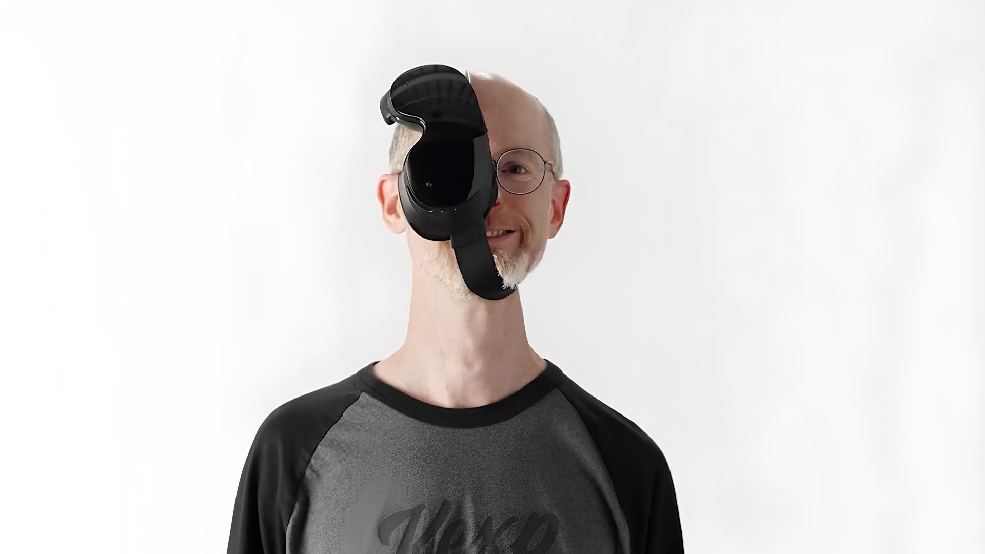 A man wearing the Steam Frame headset diagonally across his face