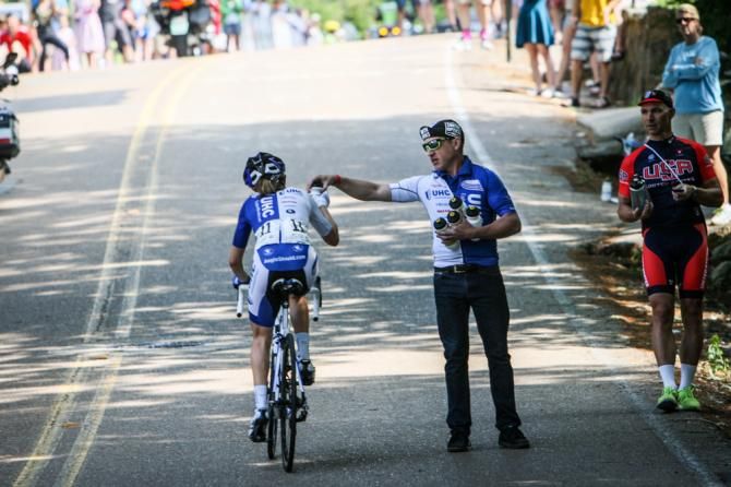 Katie Hall (UnitedHealthcare) takes a bottle before the top of the