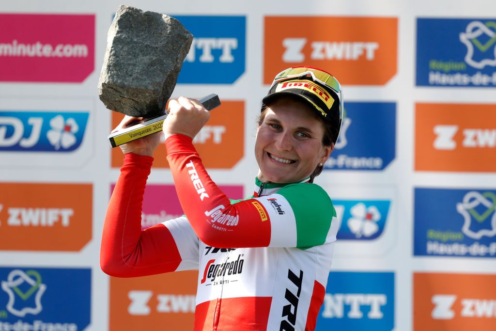 ROUBAIX FRANCE APRIL 16 Elisa Longo Borghini of Italy and Team Trek Segafredo celebrates winning the race on the podium ceremony with her Cobbleston trophy after the 2nd ParisRoubaix 2022 Womens Elite a 1247km one day race from Denain to Roubaix ParisRoubaixFemmes ParisRoubaix on April 16 2022 in Roubaix France Photo by Bas CzerwinskiGetty Images