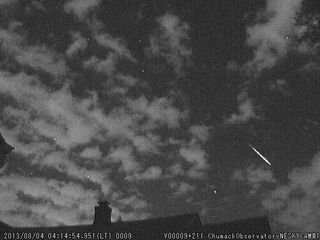 John Chumack sent in a photo of a Perseid meteor over Dayton, OH. He writes: "My meteor video camera network picked up about 2 dozen Perseid meteors coming out of the northeastern sky." Image acquired August 4, 2013.