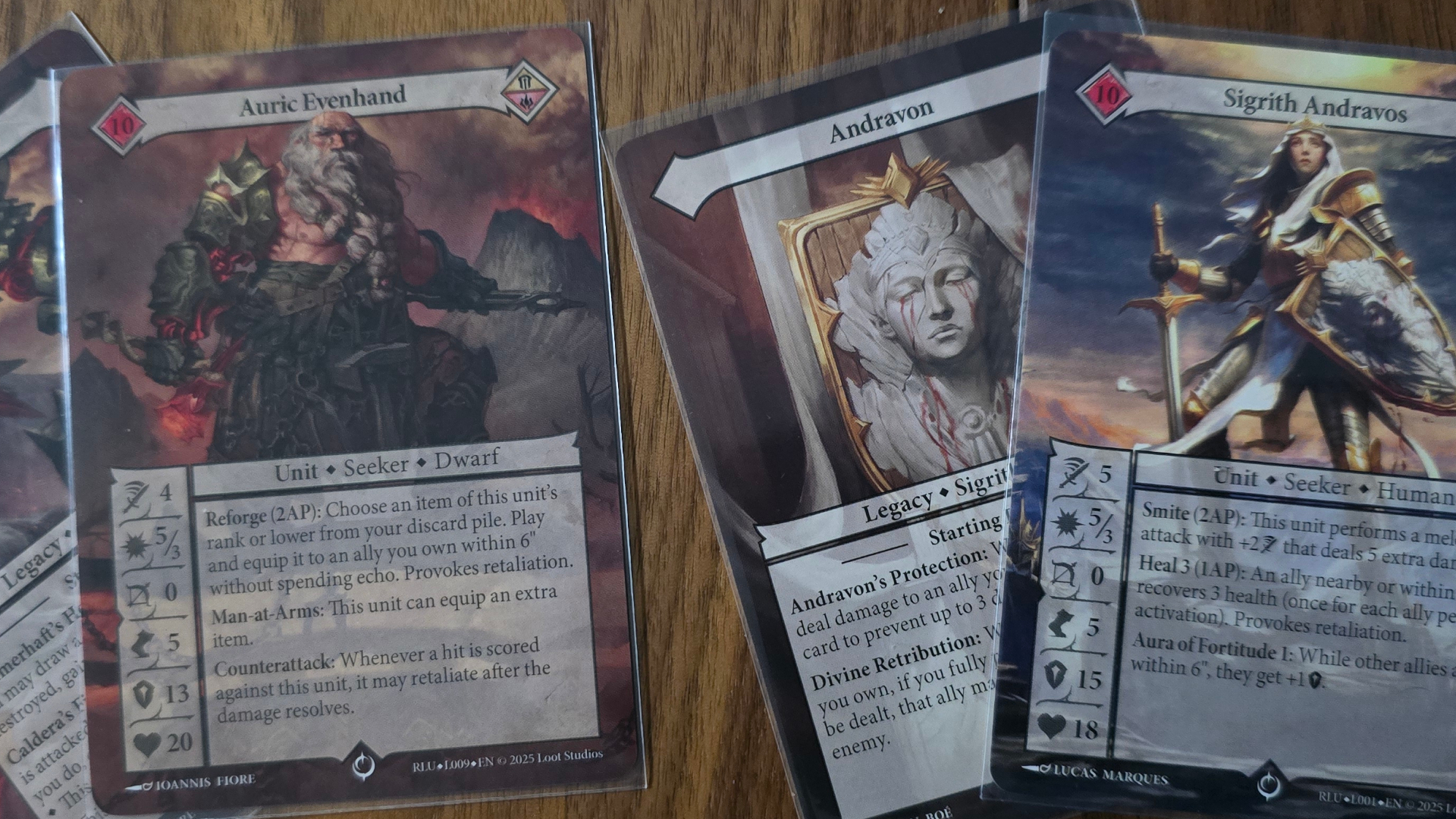 Malediction cards laid out on a wooden surface