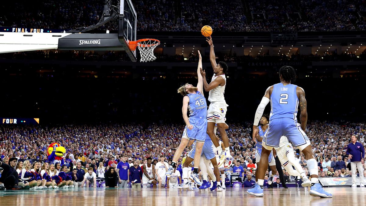 David McCormack #33 of the Kansas Jayhawks shoots over Brady Manek #45 of the North Carolina Tar Heels during the second half of the 2022 NCAA Men&#039;s Basketball Tournament National Championship game at Caesars Superdome on April 04, 2022 in New Orleans, Louisiana.