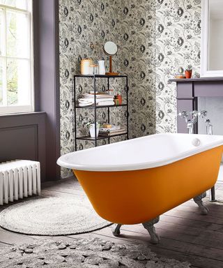 Bathroom with orange rolltop bath