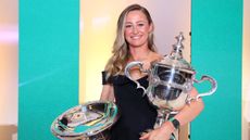 Nelly Korda with two trophies at the 2024 LPGA Awards