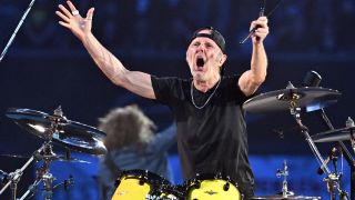 Lars Ulrich performing with Metallica in 2025