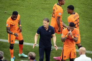 Holland boss Frank De Boer (centre) did not discuss his future after the loss