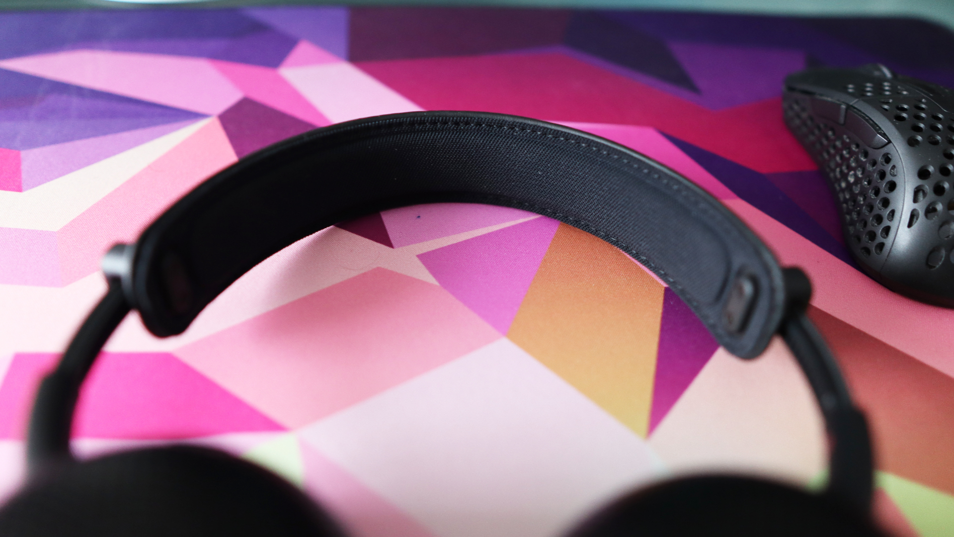 Sony Inzone H6 Air headset on a mouse pad.