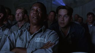Morgan Freeman and Tim Robbins watch a movie in The Shawshank Redemption