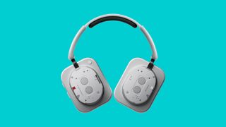 Nothing white headphones on a turquoise background